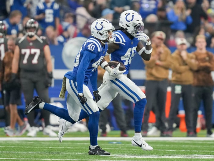 Indianapolis Colts cornerback Jaylon Jones (40) and Indianapolis Colts safety Ronnie Harrison Jr. (48) celebrate an interception Sunday, Nov. 26, 2023, during a game against the Tampa Bay Buccaneers at Lucas Oil Stadium in Indianapolis.